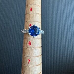 Simulated sapphire ring with CZ accents, size 5